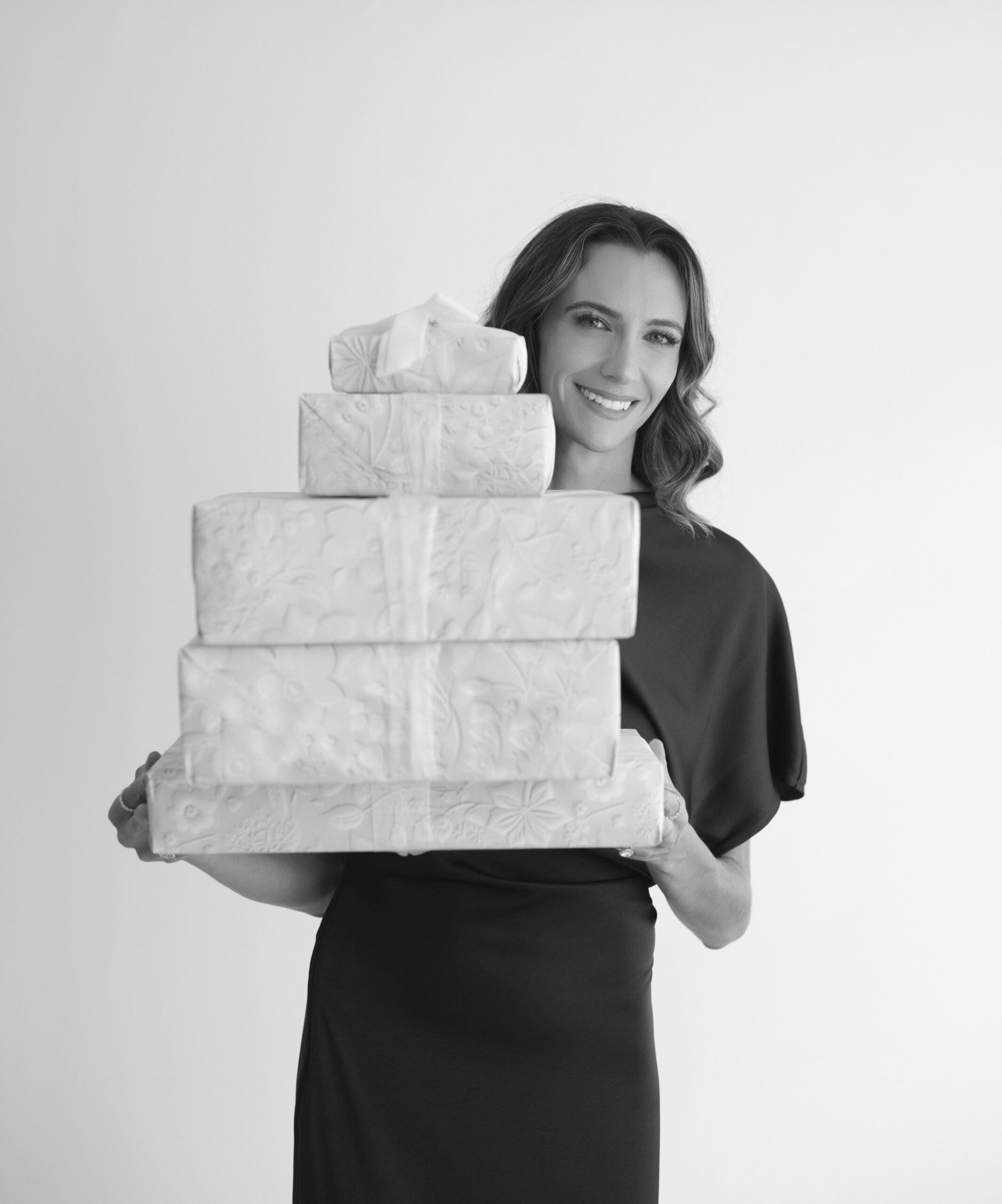 Michelle holding gift boxes